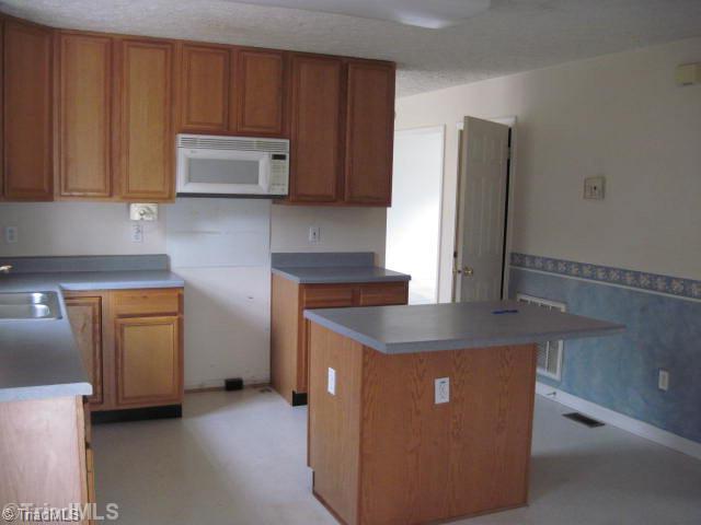 218 Pine Needles Road Reidsville, NC 27320 - Photo 4 of 9 Kitchen.
