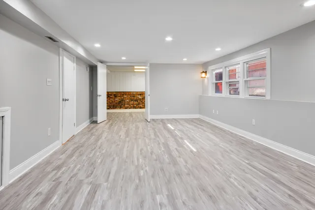 a view of a big room with wooden floor