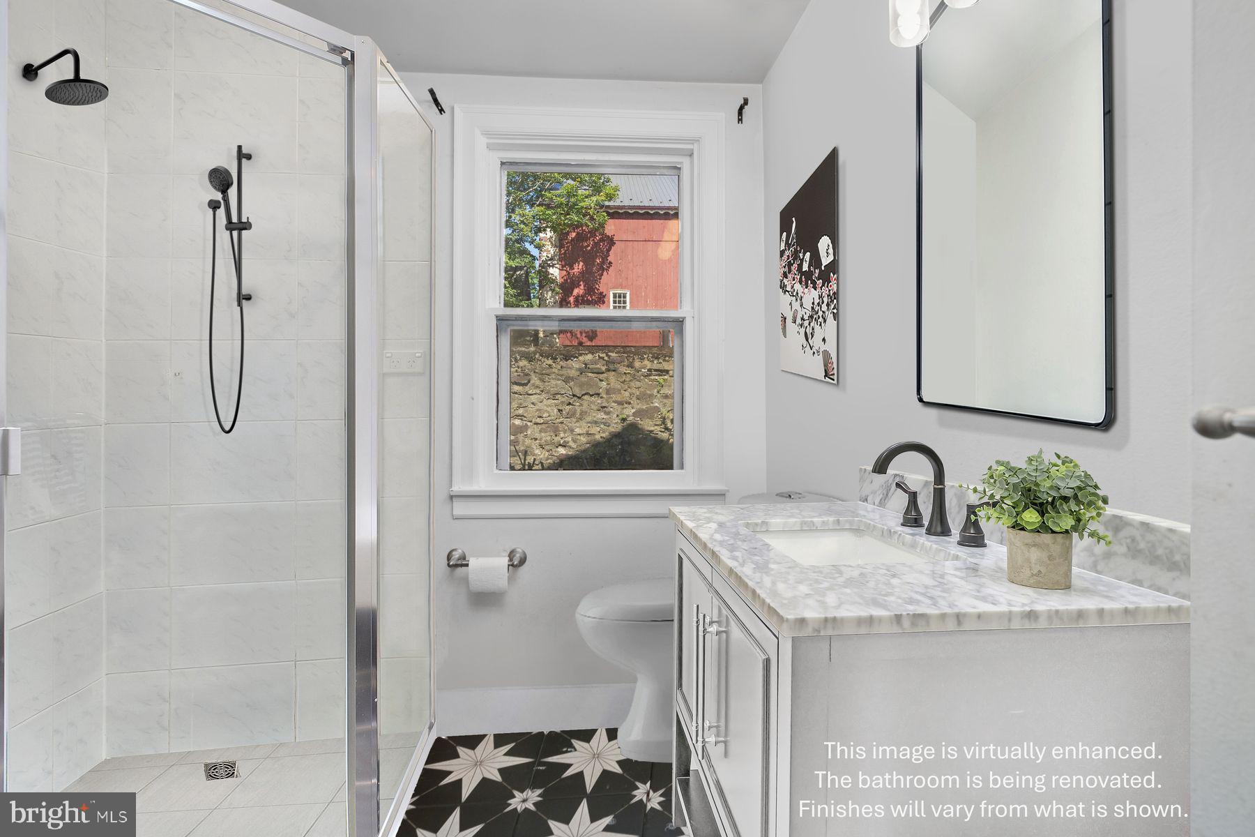 Swedesford Road Lower Gwynedd, PA 19002 - Photo 64 of 81 a bathroom with a granite countertop sink a mirror a vanity and a shower
