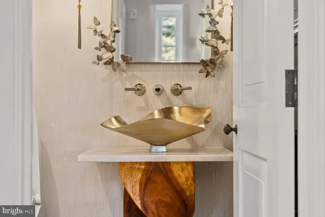 a kitchen with stainless steel appliances granite countertop a stove and refrigerator