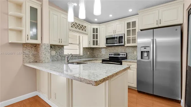 $449,700 | 570 Woodgate Circle, Unit A, Sunrise, FL 33326