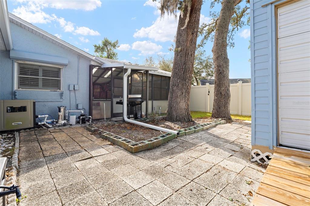 2399 Gallagher Avenue Spring Hill, FL 34606 - Photo 13 of 56 a outdoor space with barbeque area