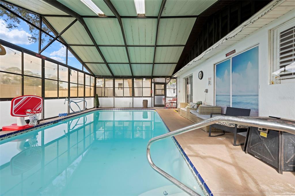 2399 Gallagher Avenue Spring Hill, FL 34606 - Photo 17 of 56 a view of a pool table with chairs