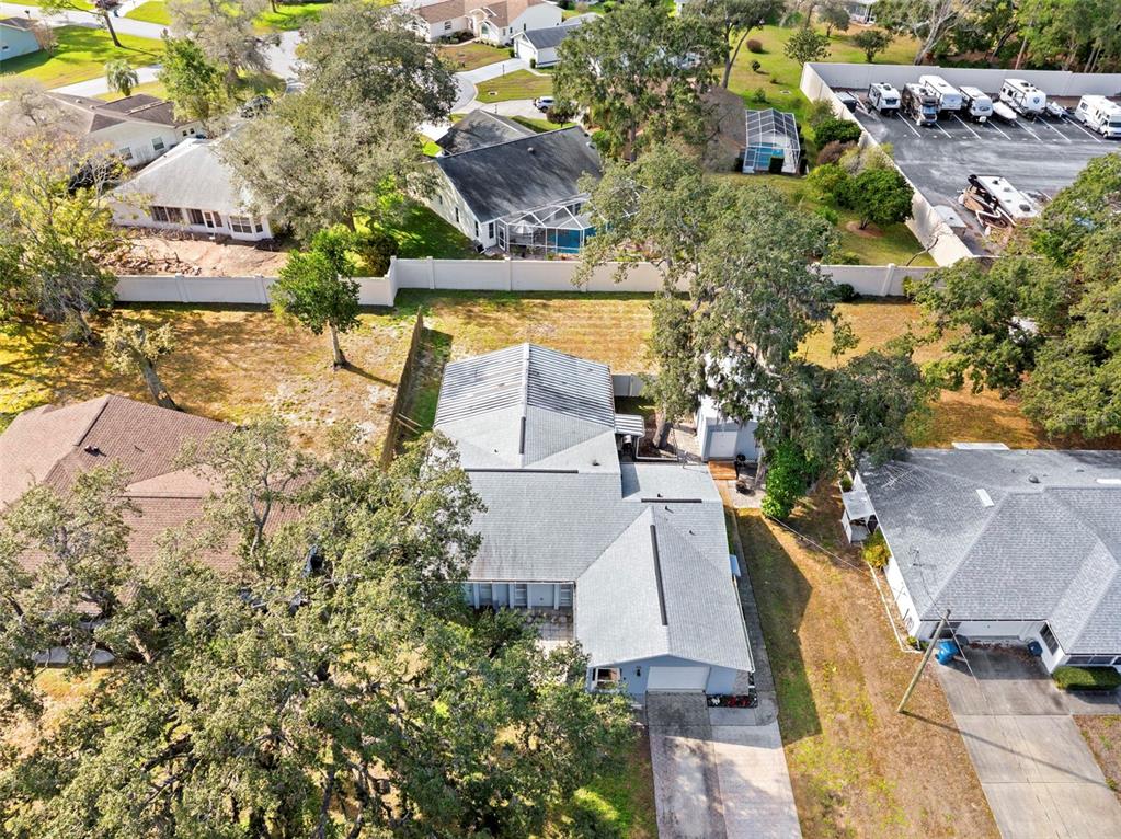 2399 Gallagher Avenue Spring Hill, FL 34606 - Photo 3 of 56 an aerial view of residential houses with outdoor space
