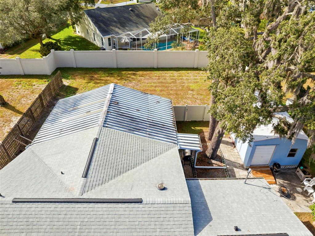 2399 Gallagher Avenue Spring Hill, FL 34606 - Photo 4 of 56 a view of a swimming pool with chairs