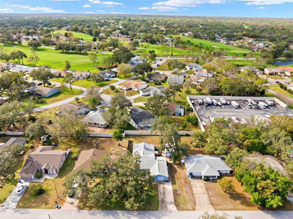 2399 Gallagher Avenue Spring Hill, FL 34606 - Photo 6 of 56 an aerial view of residential houses with outdoor space