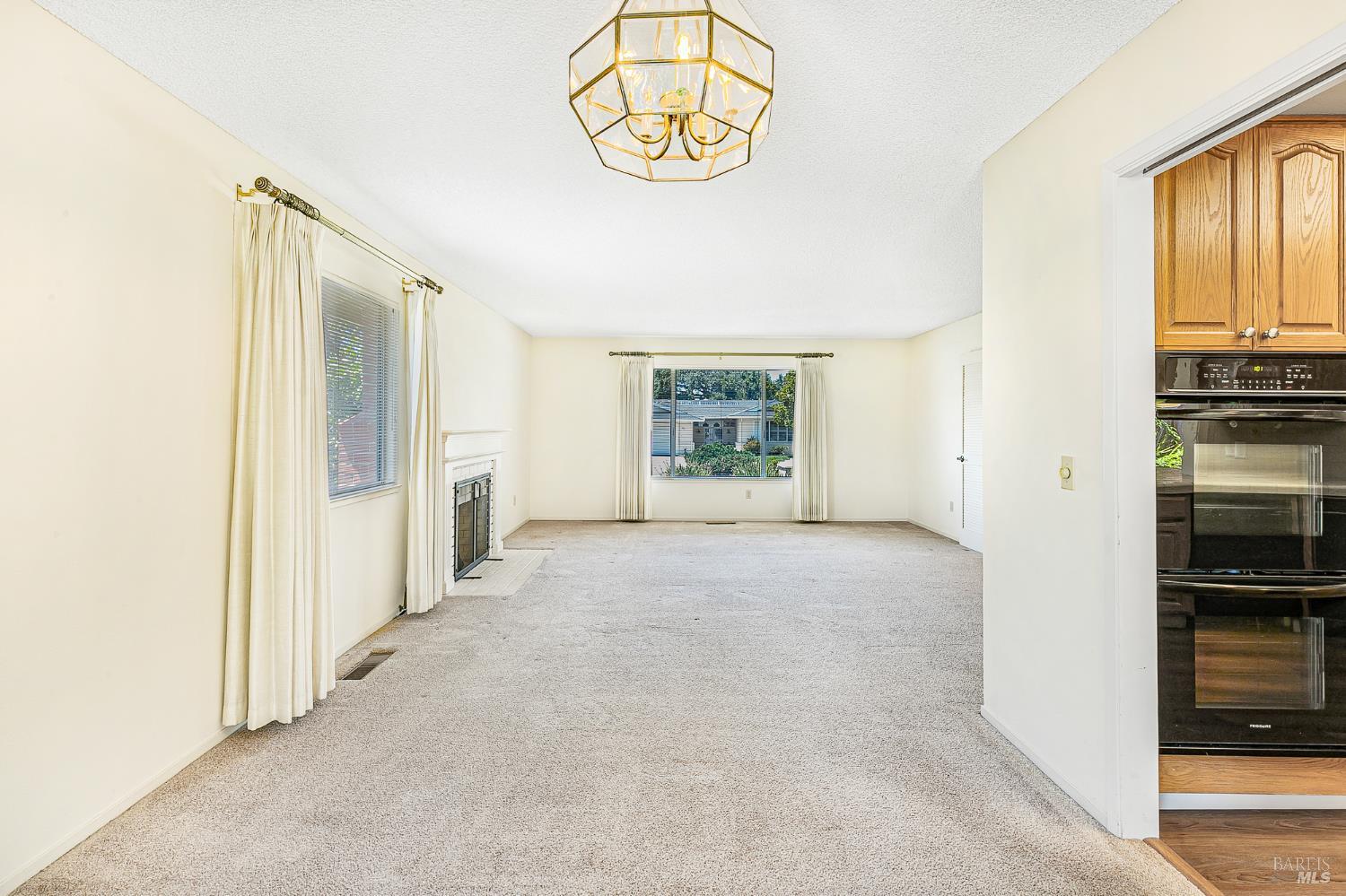 138 Oak Shadow Drive Santa Rosa, CA 95409 - Photo 15 of 50 a view of an empty room with a window