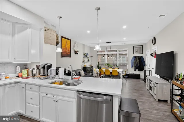 a kitchen with sink cabinets and counter top space