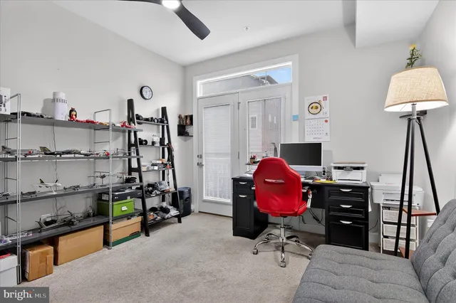 a living room with lots of furniture and baby