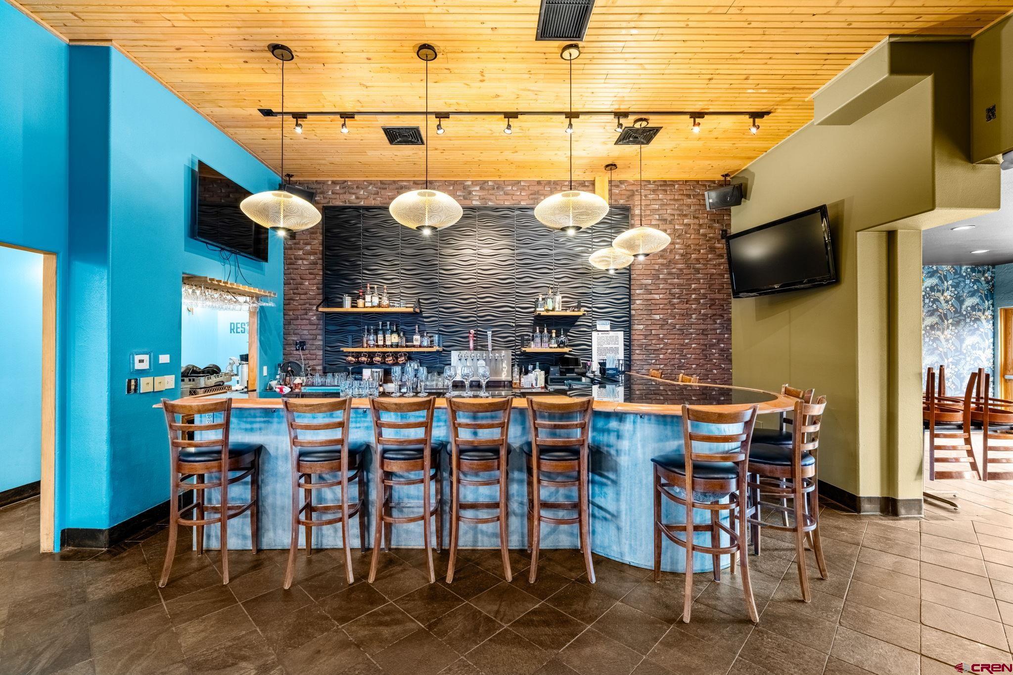 701 East 2nd Avenue Durango, CO 81301 - Photo 11 of 39 a view of a tables and chairs in the patio