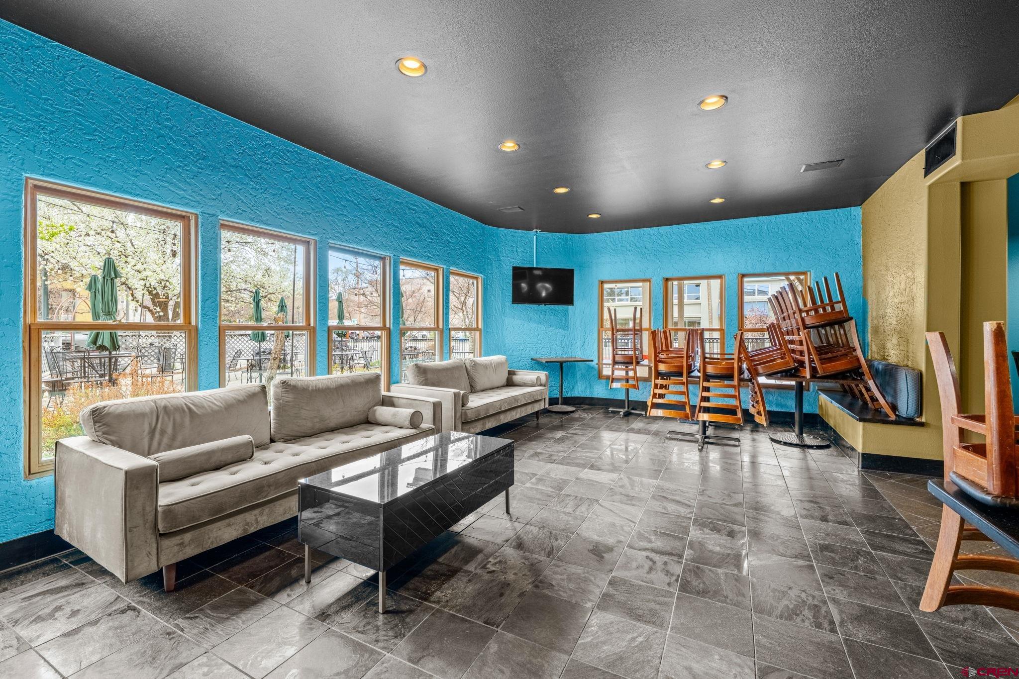 701 East 2nd Avenue Durango, CO 81301 - Photo 16 of 39 a living room with furniture and a large window