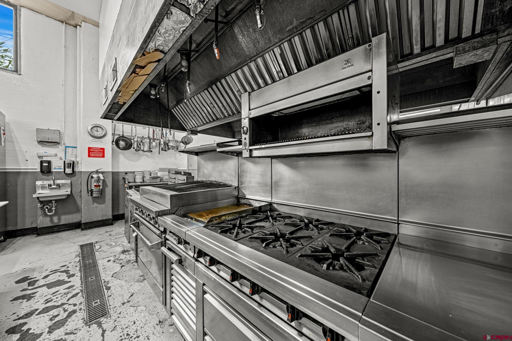 701 East 2nd Avenue Durango, CO 81301 - Photo 23 of 39 a stove top oven sitting inside of a kitchen