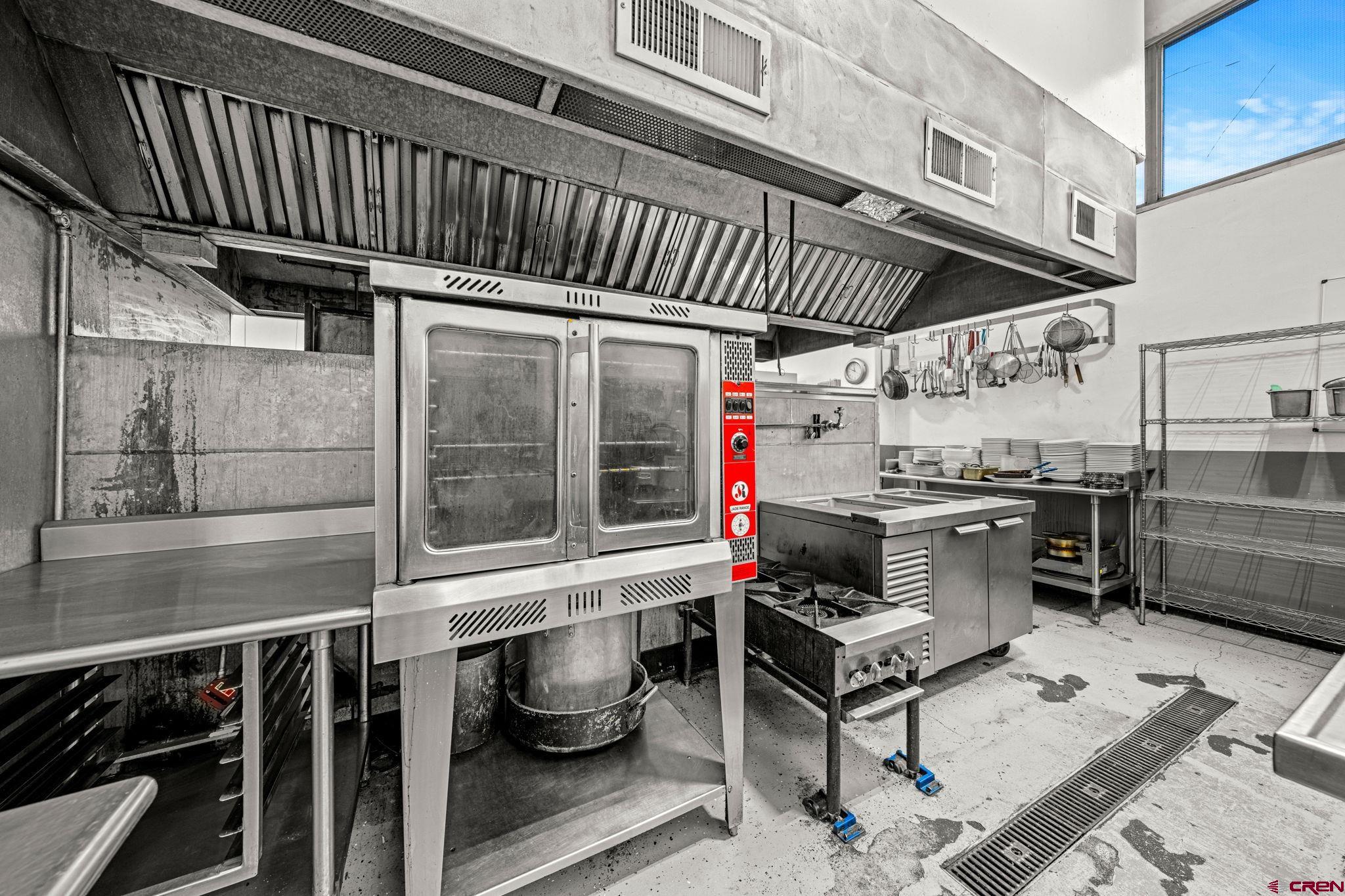 701 East 2nd Avenue Durango, CO 81301 - Photo 26 of 39 a view of a chairs and table in the patio next to a yard