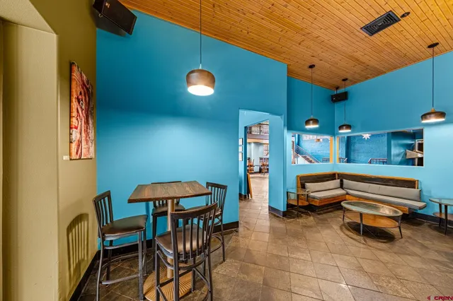 a outdoor space with patio furniture and a potted plant