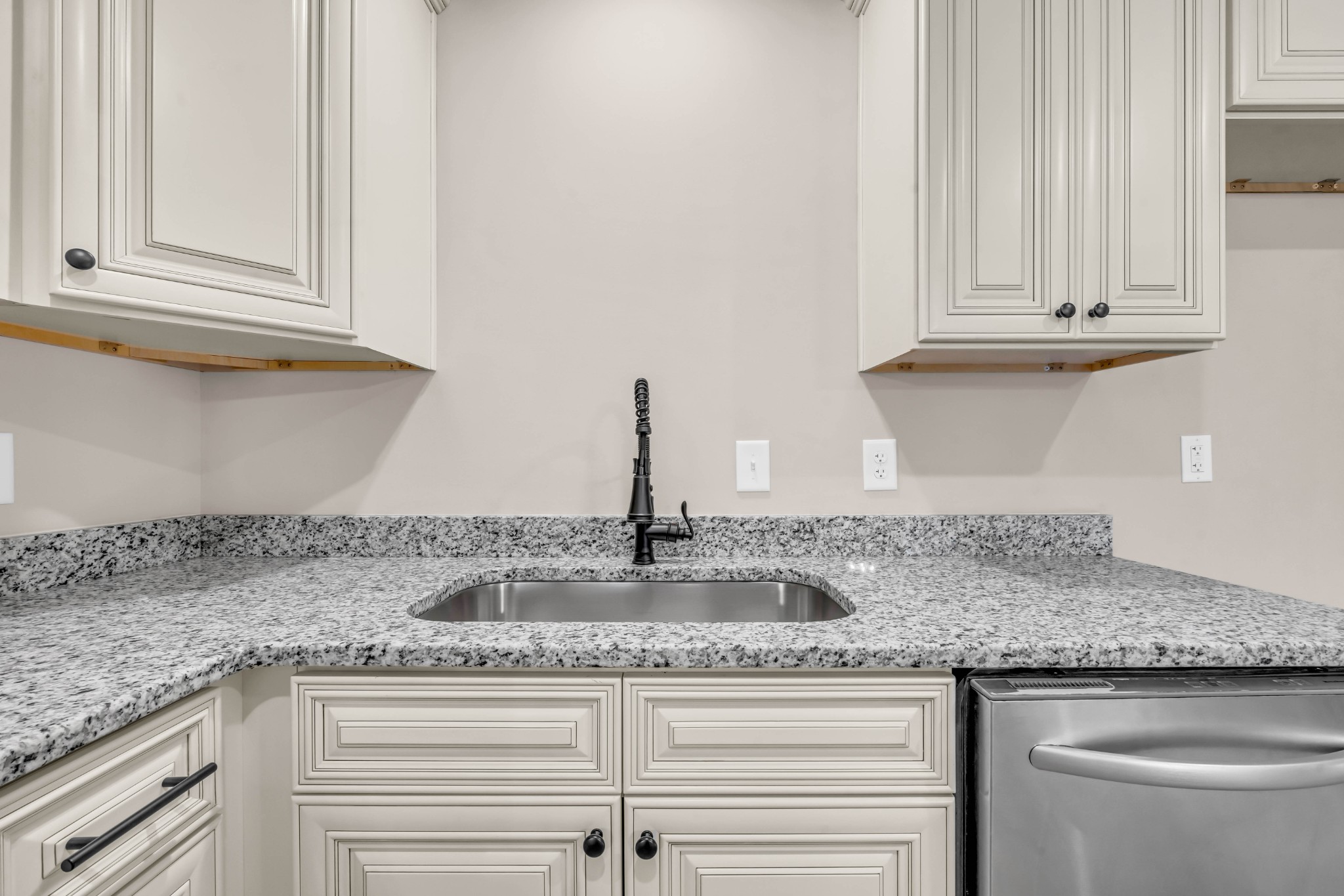 887 Harvey Road Cumberland Furnace, TN 37051 - Photo 15 of 72 a kitchen with granite countertop stainless steel appliances white cabinets and a sink