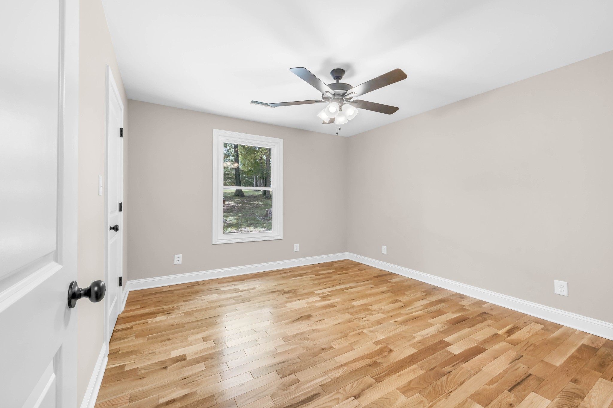 887 Harvey Road Cumberland Furnace, TN 37051 - Photo 18 of 72 a view of an empty room with a window