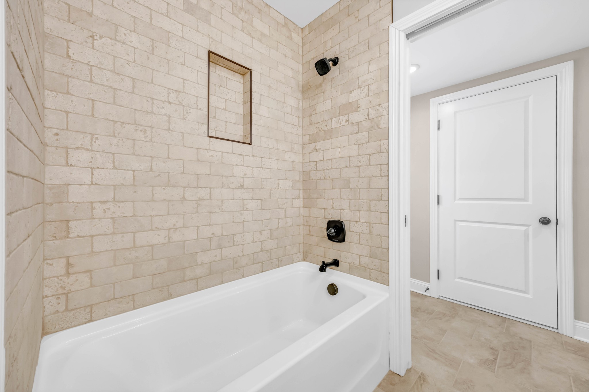 887 Harvey Road Cumberland Furnace, TN 37051 - Photo 34 of 72 a bathroom with a bathtub and shower