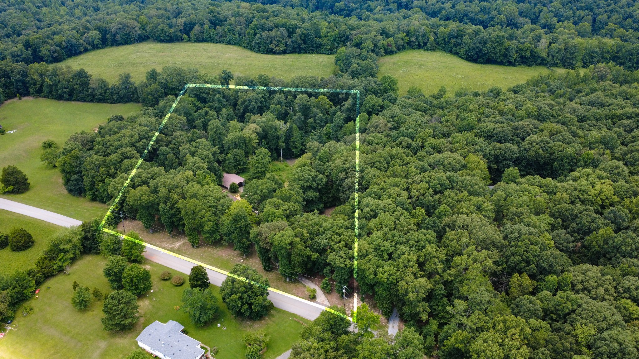 887 Harvey Road Cumberland Furnace, TN 37051 - Photo 48 of 72 an aerial view of a house and lake view