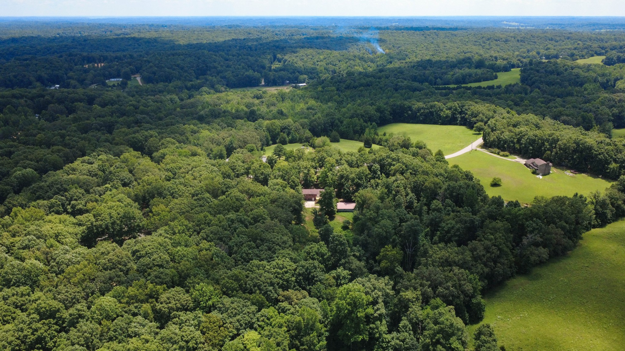 887 Harvey Road Cumberland Furnace, TN 37051 - Photo 59 of 72 an aerial view of a house with mountain view
