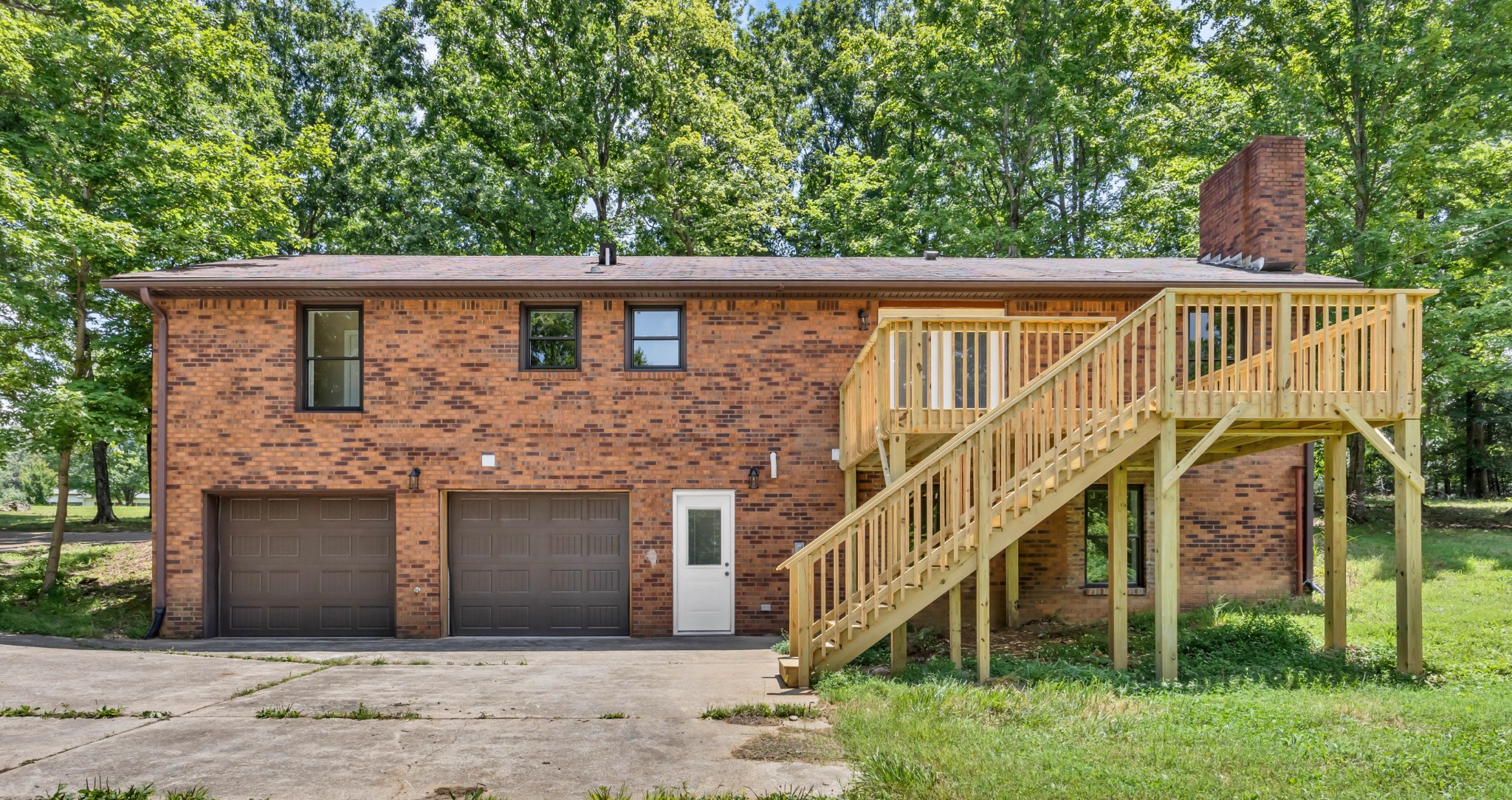 887 Harvey Road Cumberland Furnace, TN 37051 - Photo 69 of 72 a front view of a house with a yard