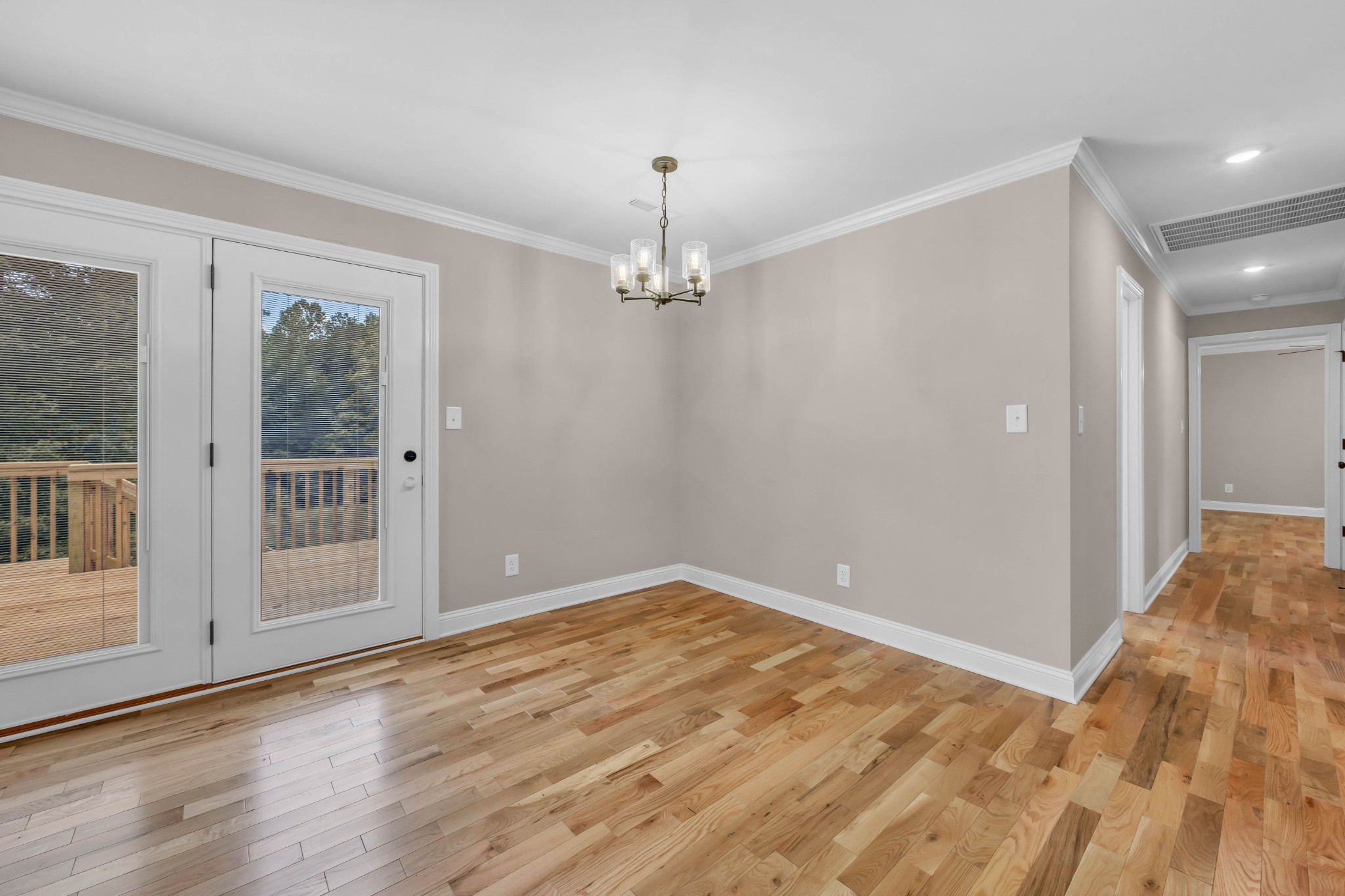 887 Harvey Road Cumberland Furnace, TN 37051 - Photo 7 of 72 a view of a room with wooden floor and windows