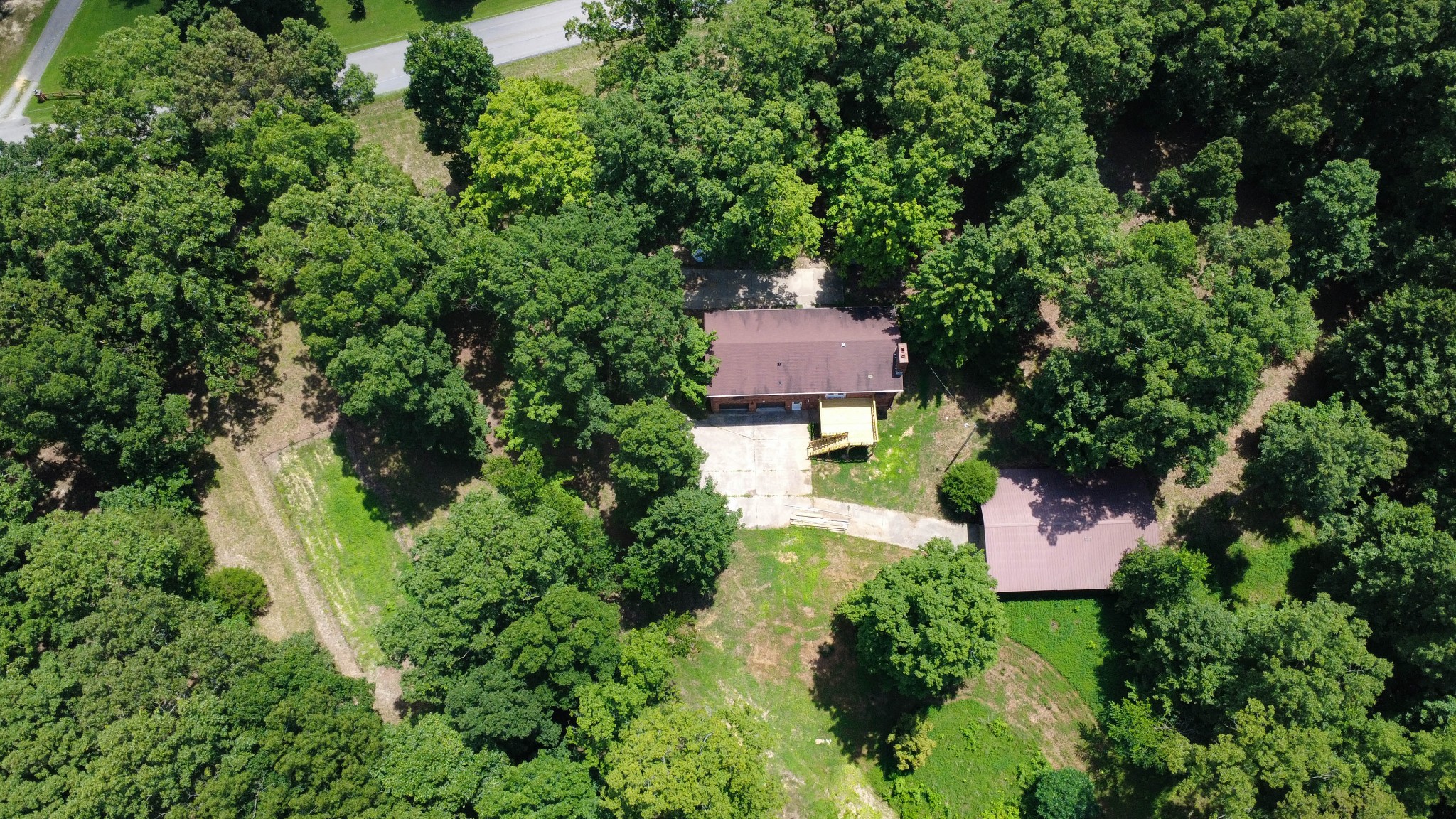 887 Harvey Road Cumberland Furnace, TN 37051 - Photo 72 of 72 an aerial view of a house with swimming pool and garden