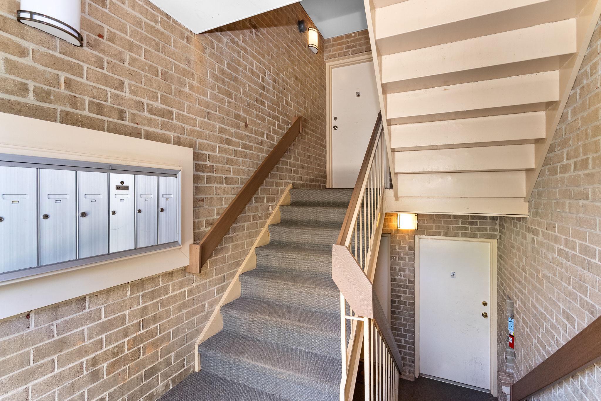 1668 Parkcrest Circle, Unit 100 Reston, VA 20190 - Photo 33 of 34 a view of entryway with wooden floor and stairs