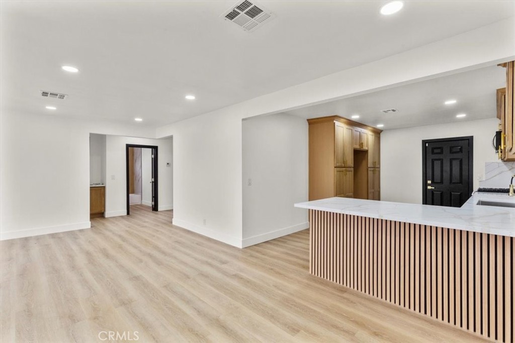 128 North Alessandro Street Hemet, CA 92543 - Photo 8 of 33 a view of a hallway