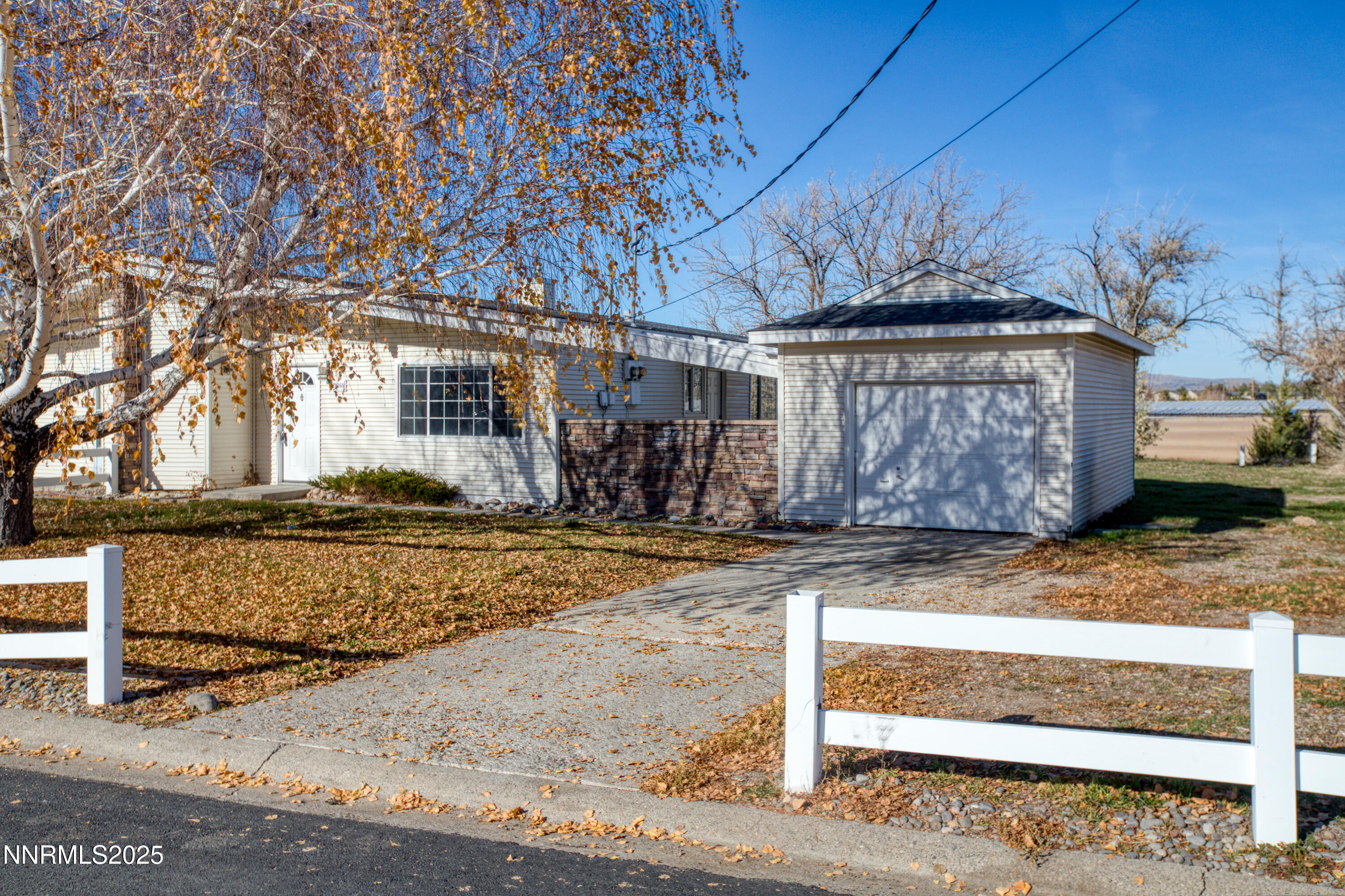 12360 Rocky Mountain Street Reno, NV 89506 - Photo 2 of 29 a view of a house with a yard