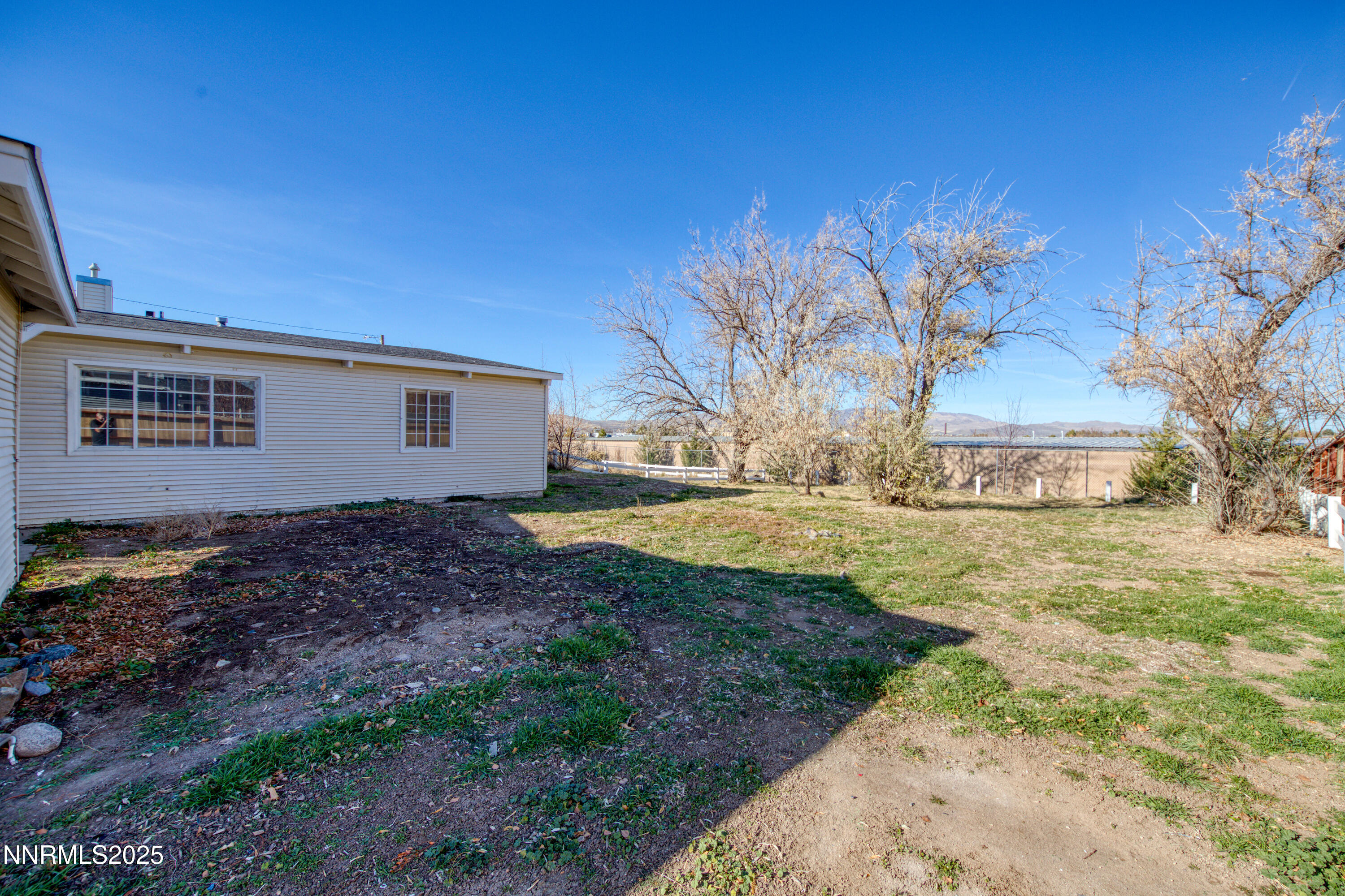 12360 Rocky Mountain Street Reno, NV 89506 - Photo 26 of 29 a view of a house with a yard