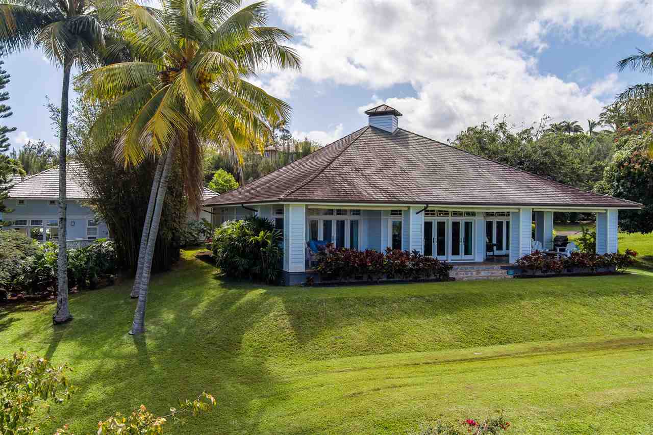 266 Waiama Way Haiku, HI 96708 - Photo 3 of 30 a front view of a house with swimming pool having green space