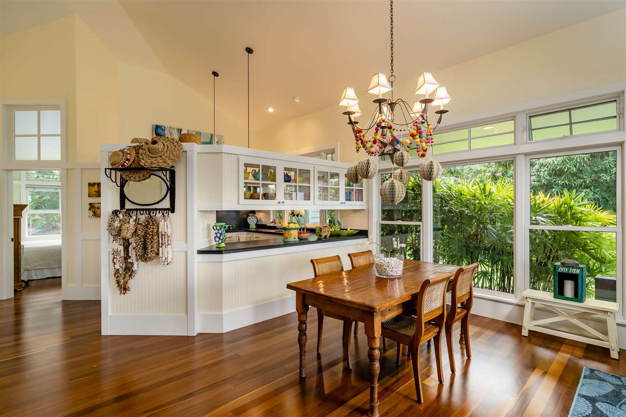 266 Waiama Way Haiku, HI 96708 - Photo 10 of 30 a view of a dining room with furniture wooden floor and chandelier