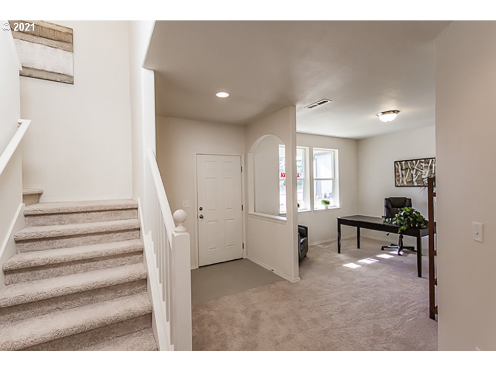 5033 Squirrel Street Springfield, OR 97478 - Photo 5 of 8 a view of entryway and hall