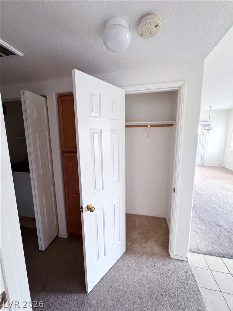 9580 West Reno Avenue, Unit 242 Las Vegas, NV 89148 - Photo 19 of 26 Organized living solutions provided by a well-appointed closet, ready for your storage needs.
