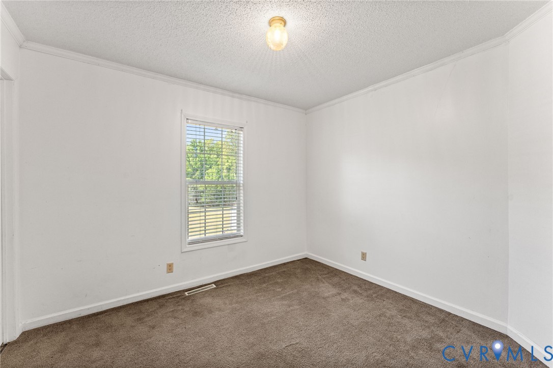 1450 Mt Prospect Road Laneview, VA 22504 - Photo 17 of 25 3rd Bedroom with wall to wall carpet & walk-in clo