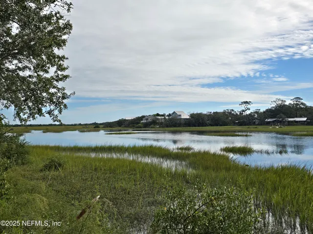 a view of a lake from a yard