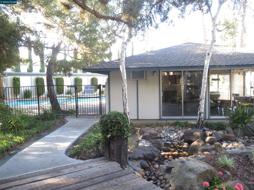 1591 Ellis Street Concord, CA 94520 - Photo 6 of 11 a front view of a house with garden
