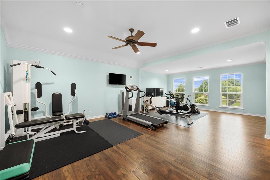 506 Meadowview Road Heath, TX 75032 - Photo 18 of 32 a view of a room with gym equipment