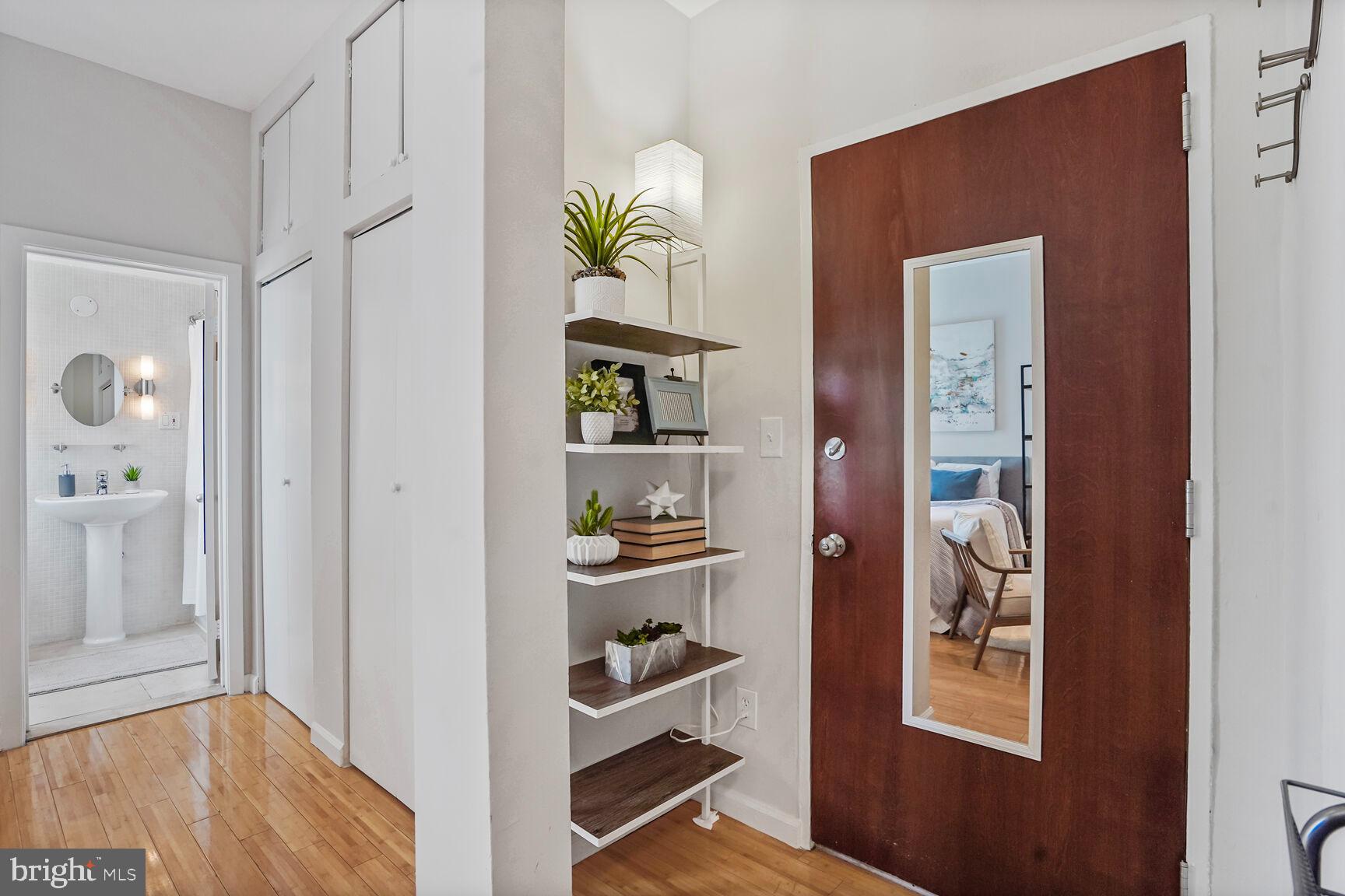 1822 15th Street Northwest, Unit 305 Washington, DC 20009 - Photo 3 of 23 Welcoming Entry, built in shelf unit