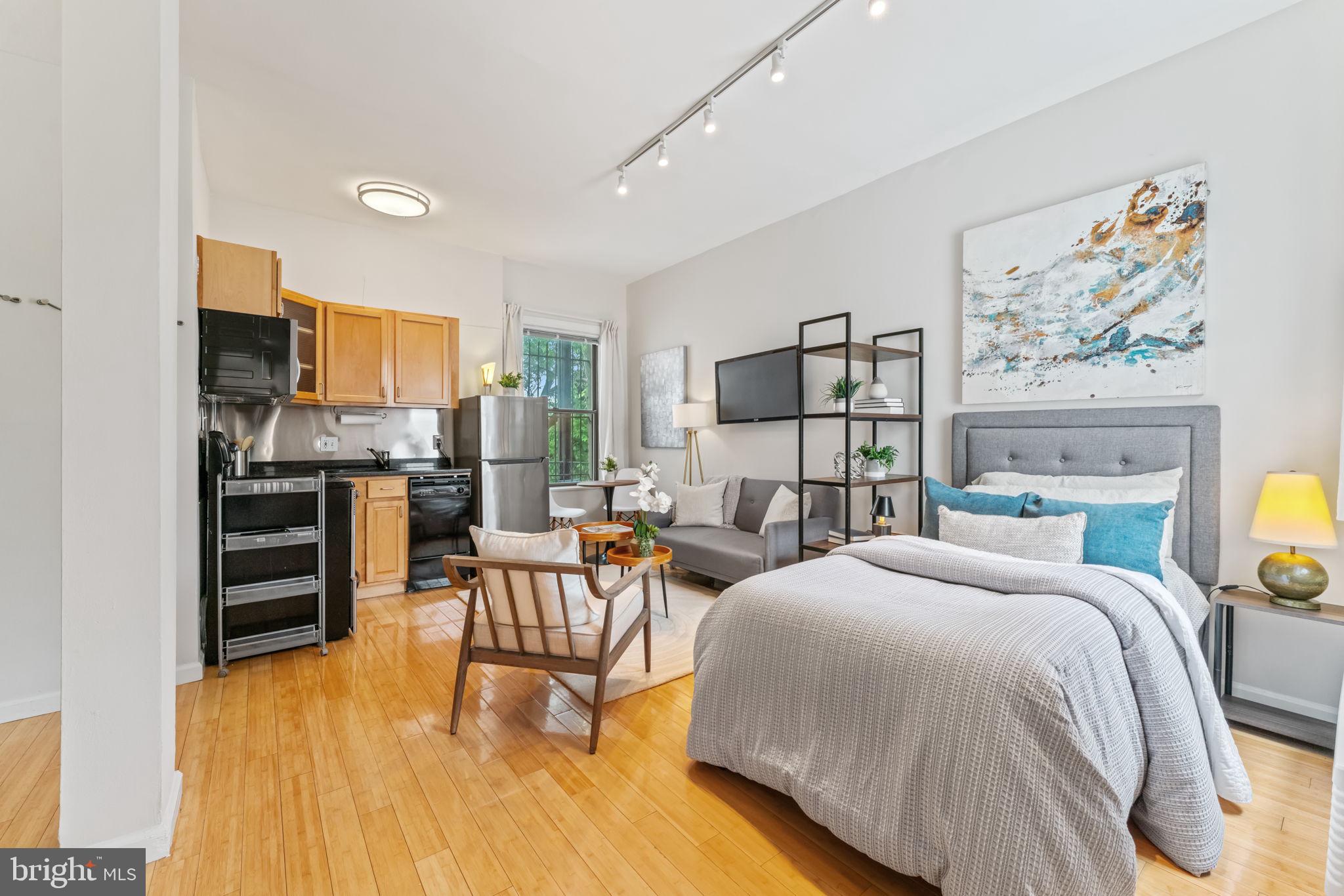 1822 15th Street Northwest, Unit 305 Washington, DC 20009 - Photo 4 of 23 Big windows for leafy views and great light