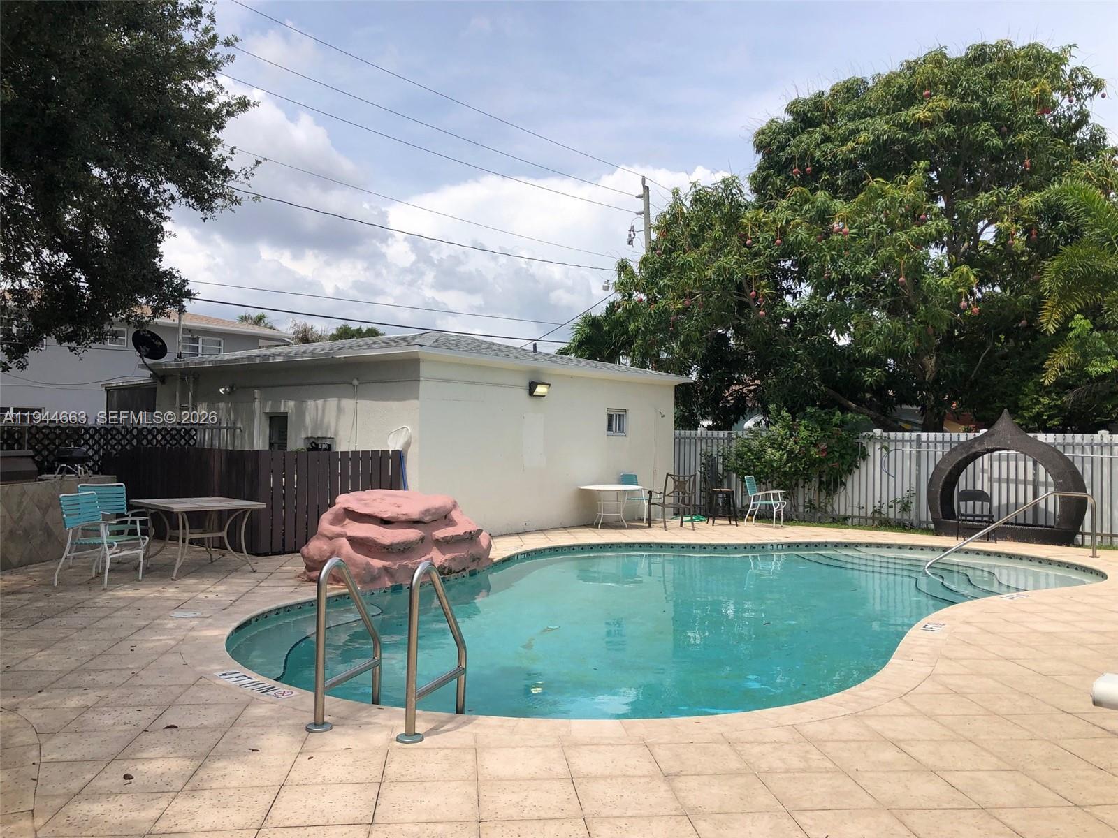 2000 Monroe Street, Unit 11 Hollywood, FL 33020 - Photo 19 of 22 a view of a backyard with sitting area