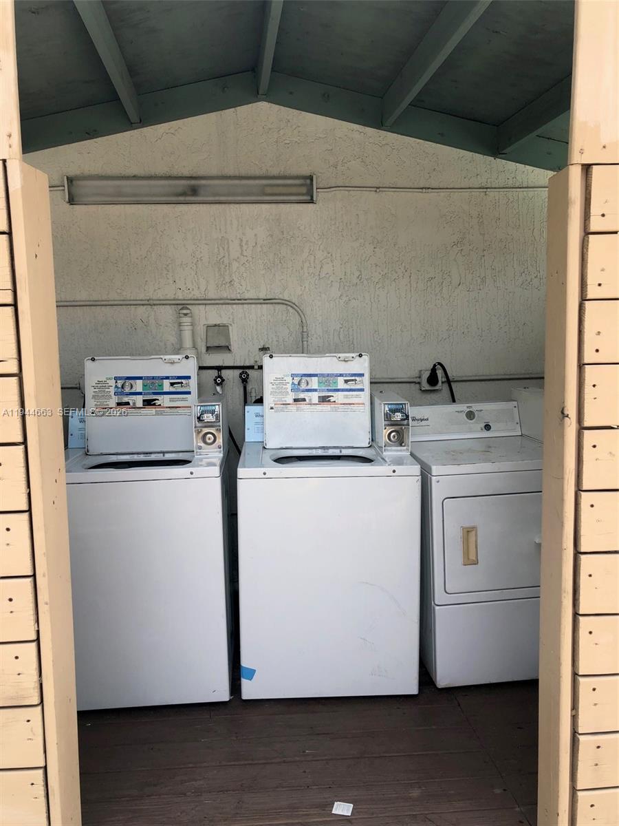 2000 Monroe Street, Unit 11 Hollywood, FL 33020 - Photo 20 of 22 a utility room with dryer and washer