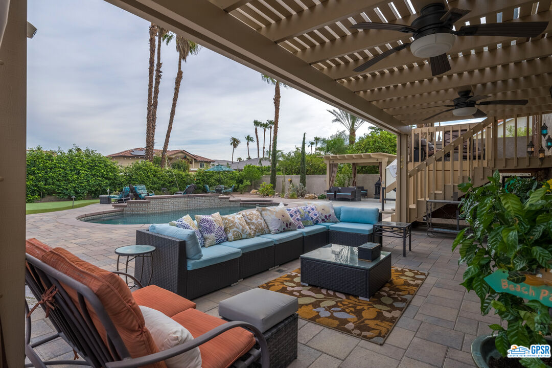 68554 Durango Road Cathedral City, CA 92234 - Photo 36 of 47 a outdoor living space with patio furniture and garden view
