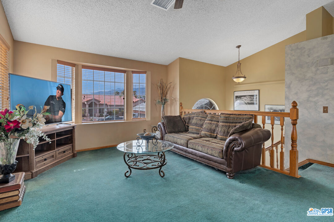 68554 Durango Road Cathedral City, CA 92234 - Photo 4 of 47 a living room with furniture and a window