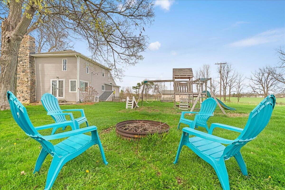 975 South Elliott Road Fowlerville, MI 48836 - Photo 7 of 56 56-Media Jett - 29