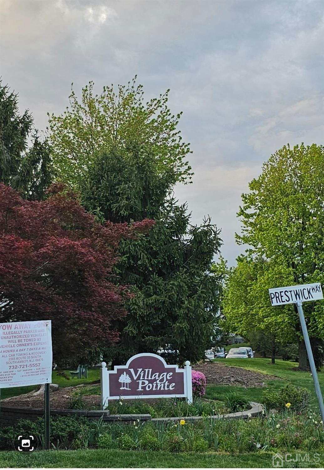 112 Prestwick Way Edison, NJ 08820 - Photo 4 of 24 a sign that is on the side of a road
