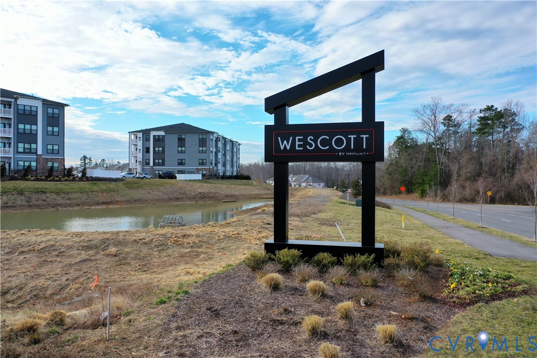12438 Wescott Avenue Midlothian, VA 23112 - Photo 24 of 34 a view of a street with a building in the background
