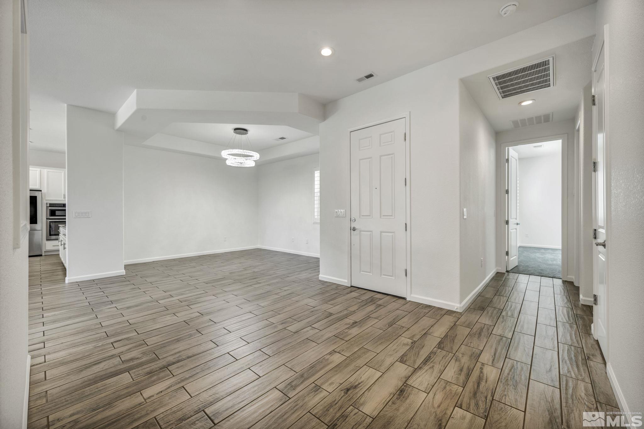 2013 Neviekay Lane Reno, NV 89521 - Photo 13 of 35 a view of a livingroom with wooden floor