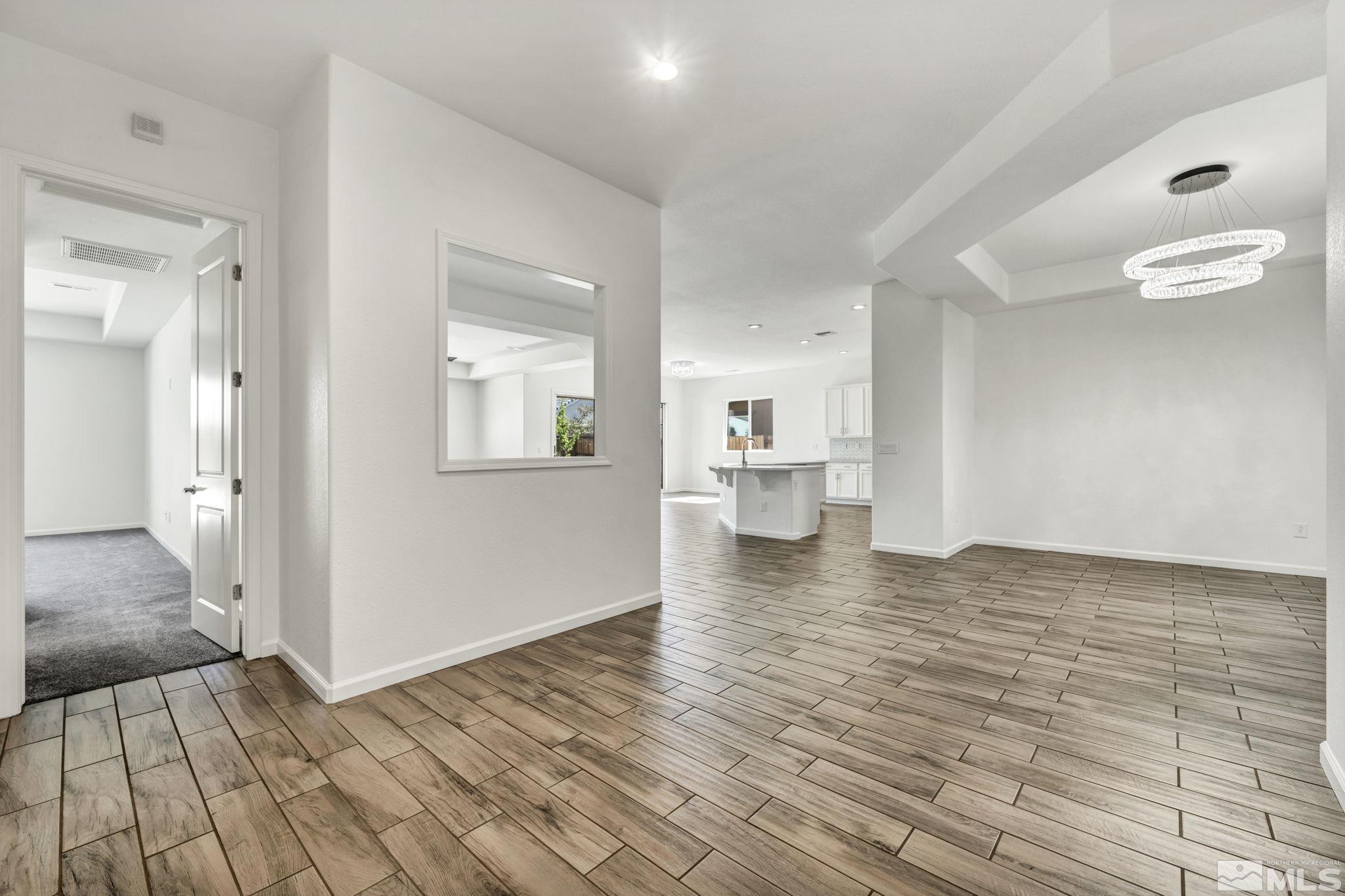 2013 Neviekay Lane Reno, NV 89521 - Photo 14 of 35 a view of a room with wooden floor and a bathroom