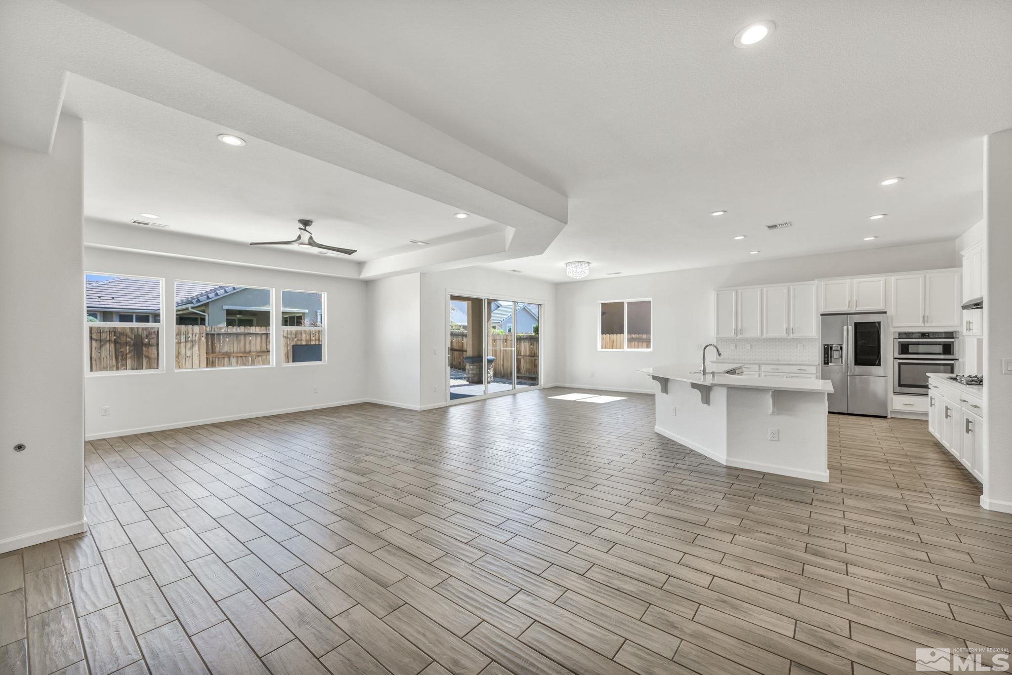 2013 Neviekay Lane Reno, NV 89521 - Photo 16 of 35 a view of a living room kitchen and a kitchen counter tops with wooden floors